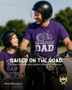 Father and child ride motorcycle wearing matching shirts.
