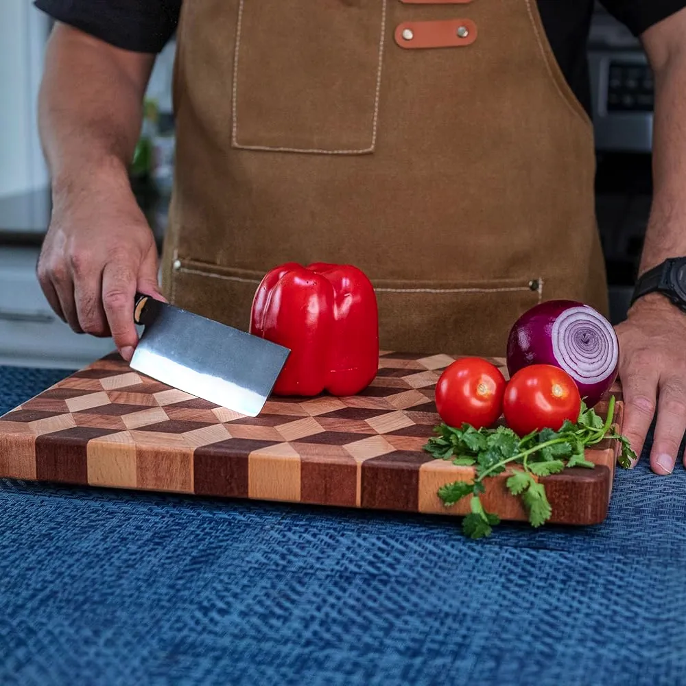 Cutting board with vegetables and knife on table.
