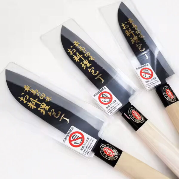 Three Japanese kitchen knives with protective covers.