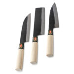 Three Japanese kitchen knives with wooden handles.