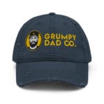 Distressed dad hat with curved brim and soft crown in worn-in style by Grumpy Dad Co