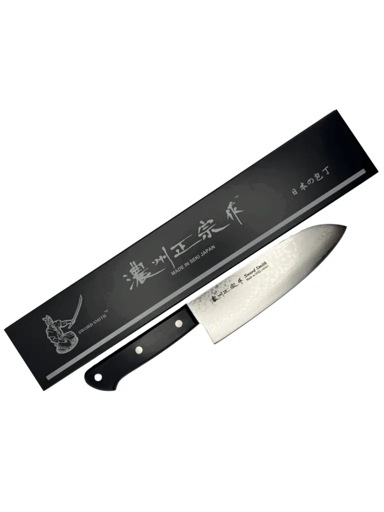 Japanese chef knife with black handle and box.