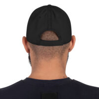 Back view of person wearing black baseball cap