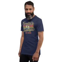 Man wears 'Promoted to Grandpa 2025' shirt