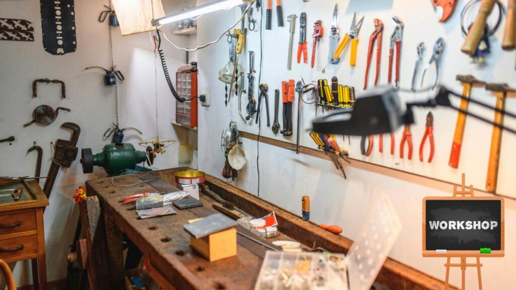 Workshop with tools on walls and workbench.