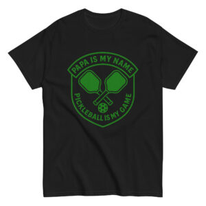 Black shirt with pickleball paddle design and slogan