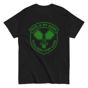 Black shirt with pickleball paddle design and slogan