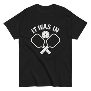 Black shirt with pickleball paddles and text design.