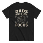 T-shirt with 'Dads Never Lose Focus' slogan.