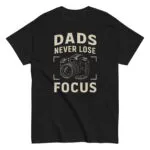 T-shirt with 'Dads Never Lose Focus' slogan.
