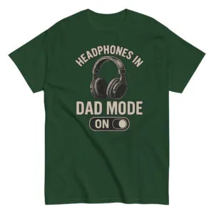 Green shirt with 'Dad Mode On' headphones design.