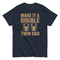 Navy shirt with 'Make It A Double' text, glasses.