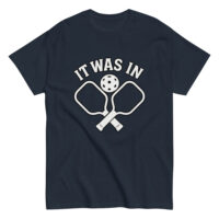 Navy pickleball t-shirt with paddles, ball, text design.