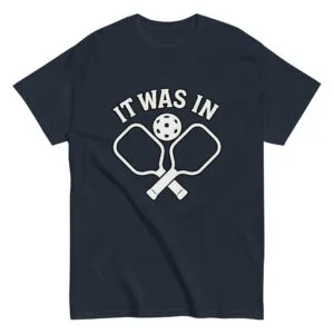Navy pickleball t-shirt with paddles, ball, text design.