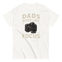 T-shirt with camera graphic and dad quote.