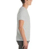 Side view of man in gray t-shirt and jeans.