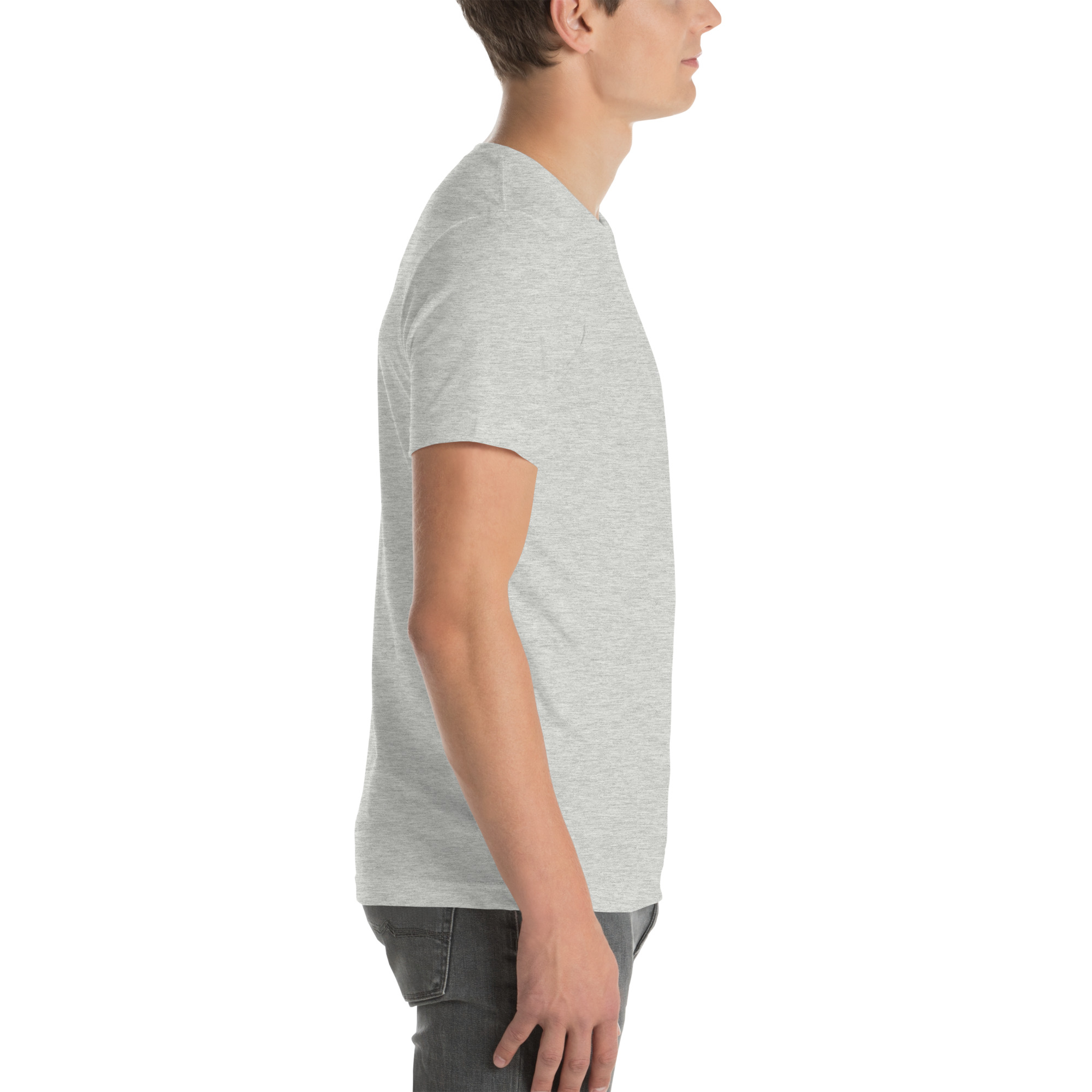unisex-staple-t-shirt-athletic-heather-right-68f7bb5a8c90f.jpg Side view of man in gray t-shirt and jeans.