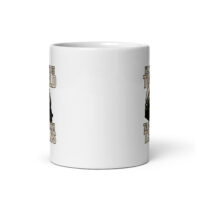 White ceramic mug with train illustration and text.