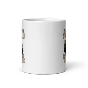 White ceramic mug with train illustration and text.
