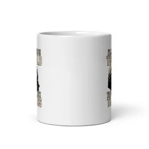 White ceramic mug with train illustration and text.