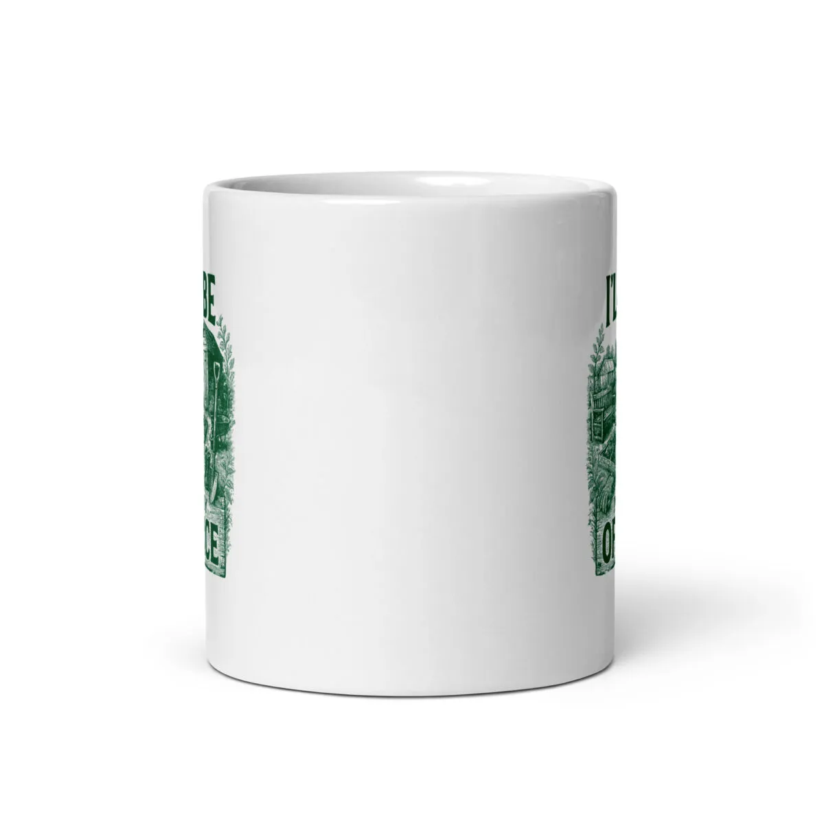 White mug with green intricate design