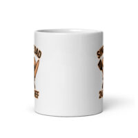 White mug with spatula design and text.