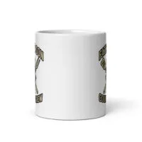 White mug with barbecue-themed design.