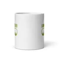 White mug with green text and grass logo.