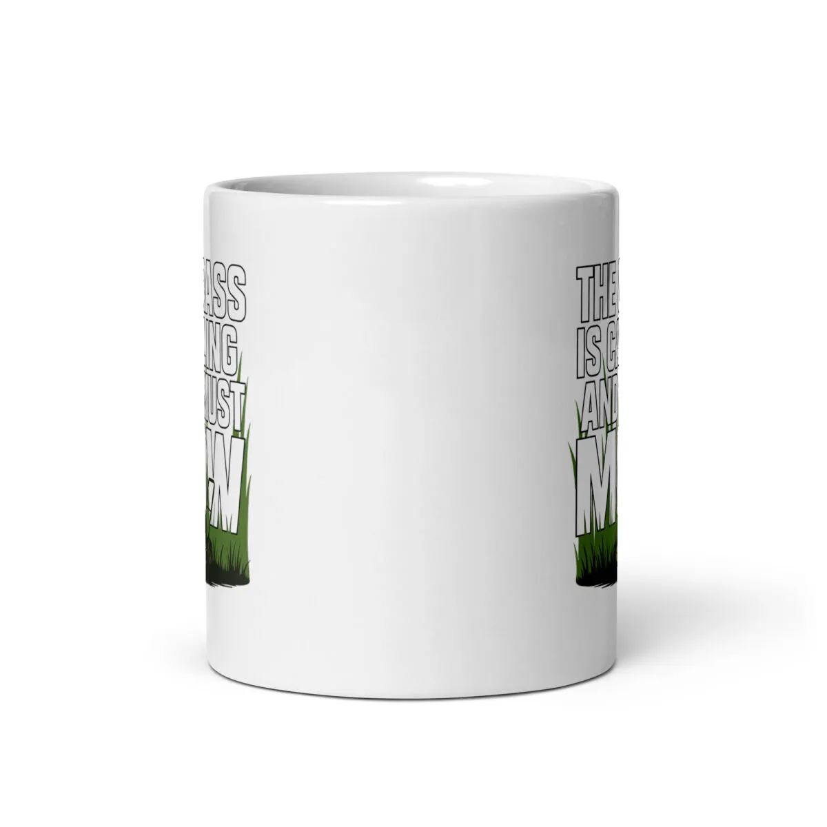 White mug with grass-themed text design.