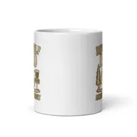 White mug displaying disc golf design.
