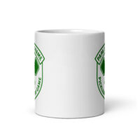 White mug with green pickleball design.