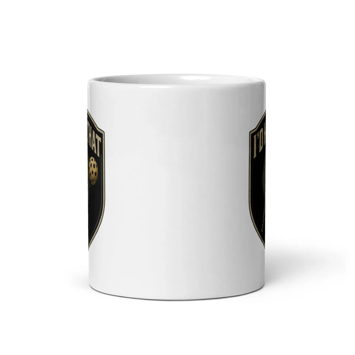 White mug with black and gold shield design.
