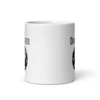 White mug with dinosaur egg illustration