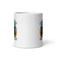 White mug with gaming design and text.