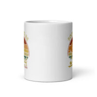 White coffee mug with colorful design.