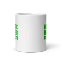 White coffee mug with green text design.