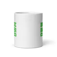 White coffee mug with green text design.