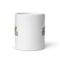 White mug with green leaf design, 'The Vegan Teacher'