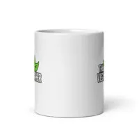 White mug with green leaf design, 'The Vegan Teacher'
