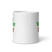 White mug with green and brown text design