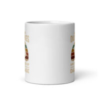 White mug with vintage design, partially visible text.