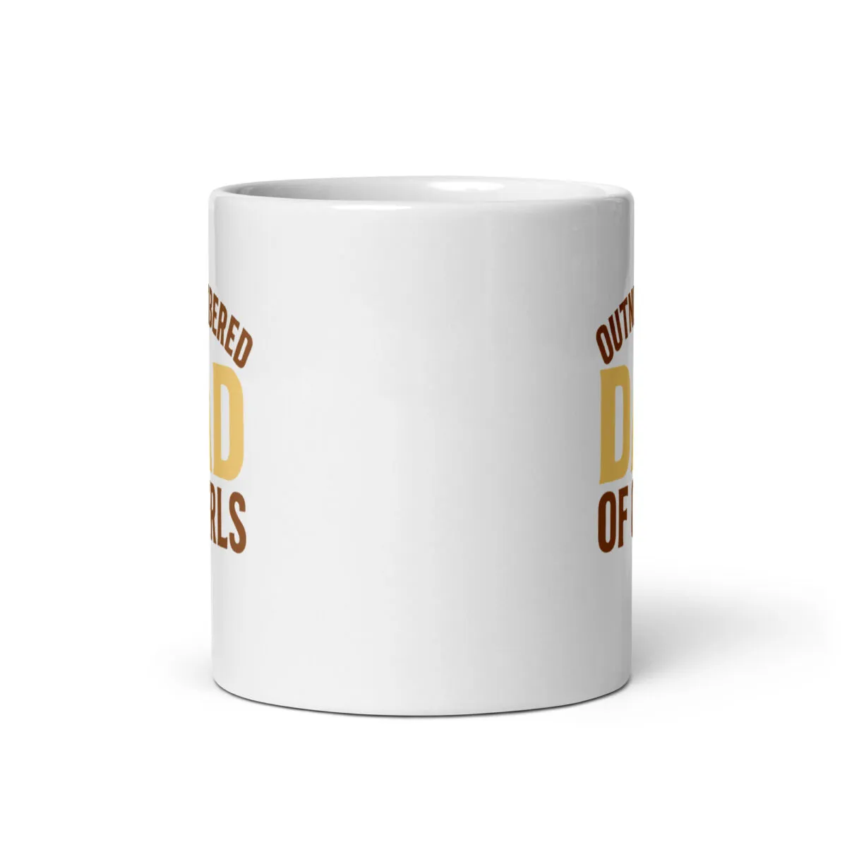 White mug with partial motivational text.