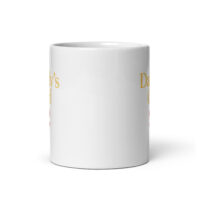 White ceramic mug with partial gold text