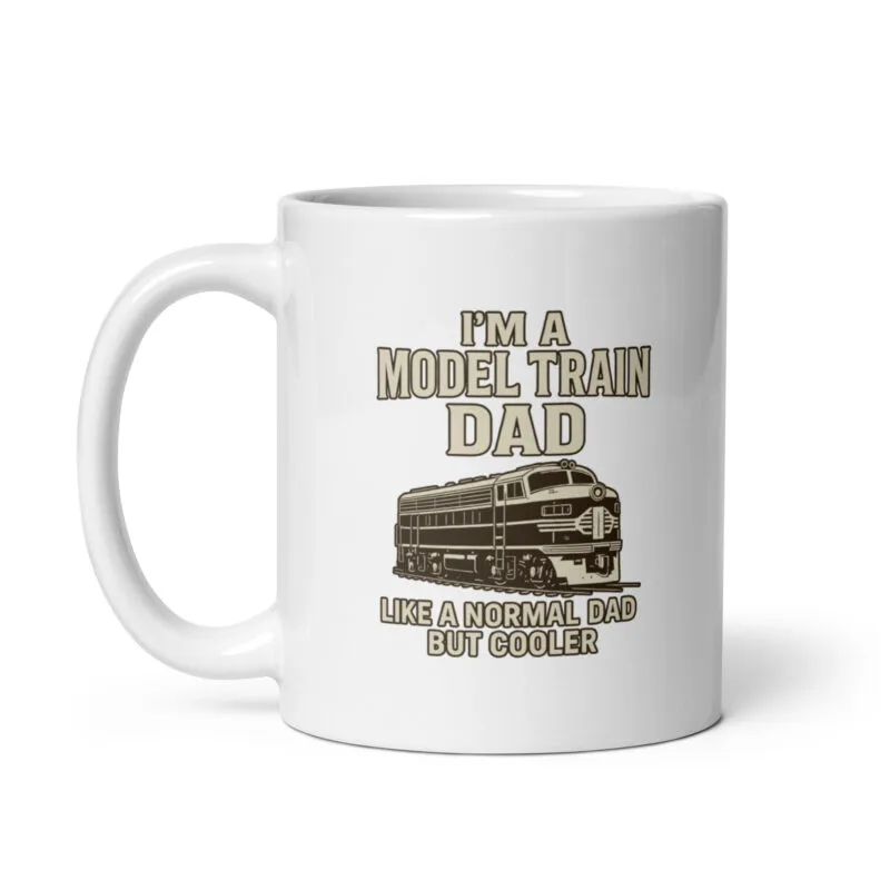 White mug with 'Model Train Dad' design.