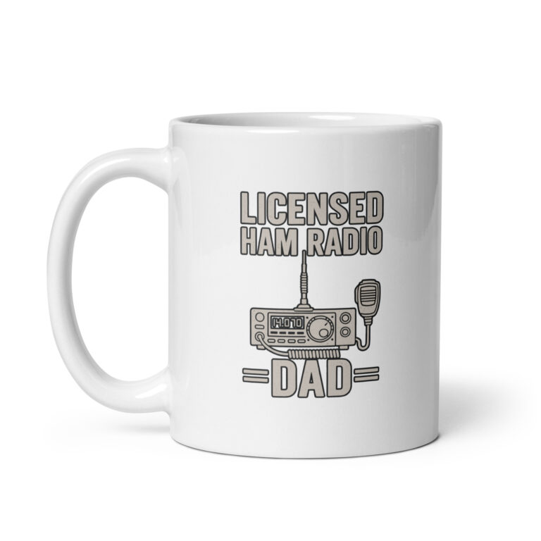 White mug with 'Licensed Ham Radio Dad' design.