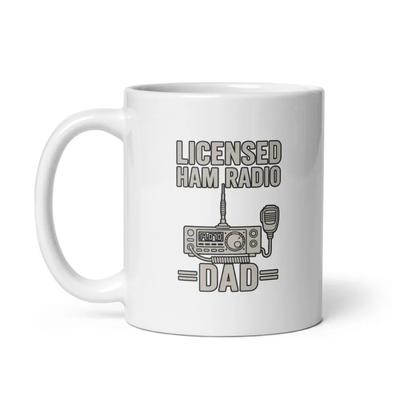 White mug with 'Licensed Ham Radio Dad' design.
