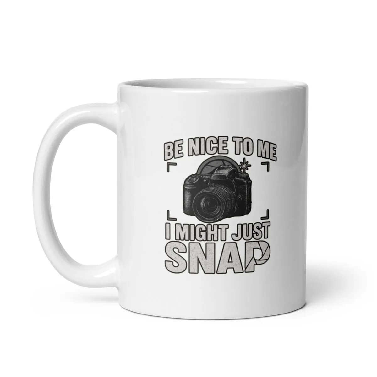 White mug with camera-themed design and humor text.