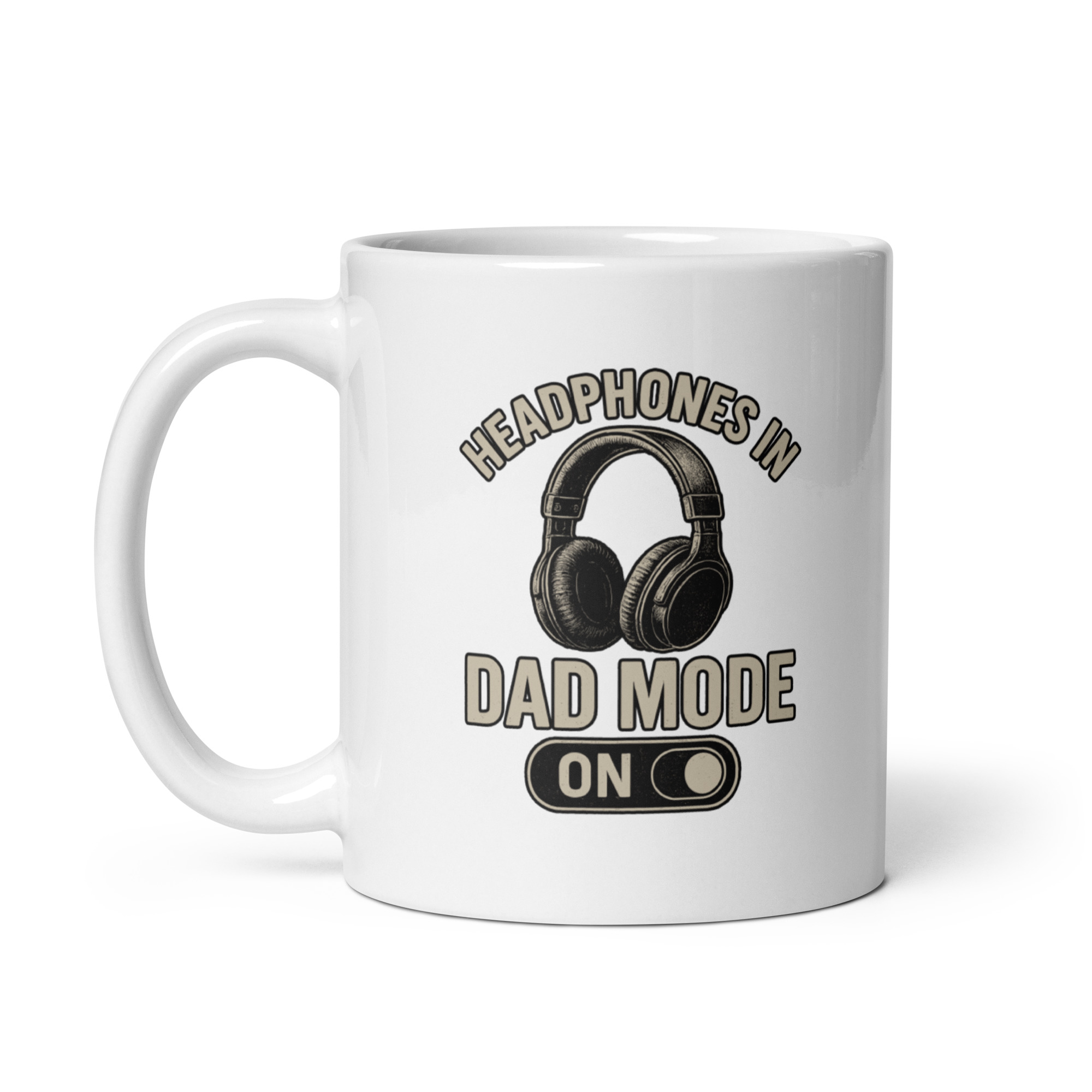 white-glossy-mug-white-11-oz-handle-on-left-68f1e1196c34a.jpg White mug with headphones and dad mode text.