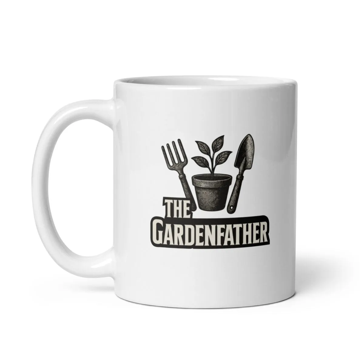 Gardening-themed mug with plant, fork, shovel.