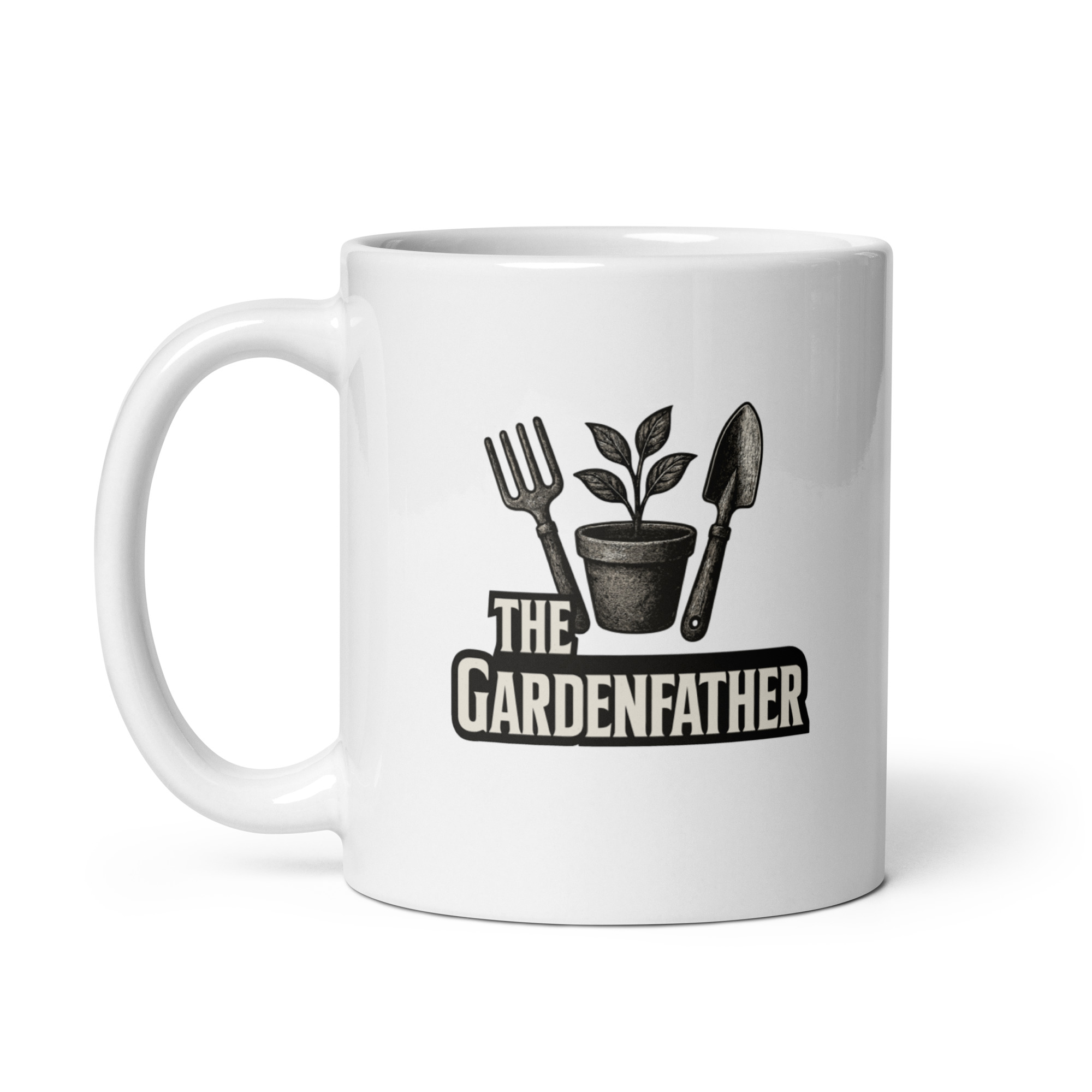 white-glossy-mug-white-11-oz-handle-on-left-68f1f6a1b0871.jpg Gardening-themed mug with plant, fork, shovel.